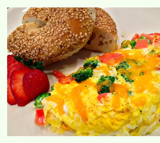 Scrambled eggs and a bagel with fresh fruit at Fitzpatrick's