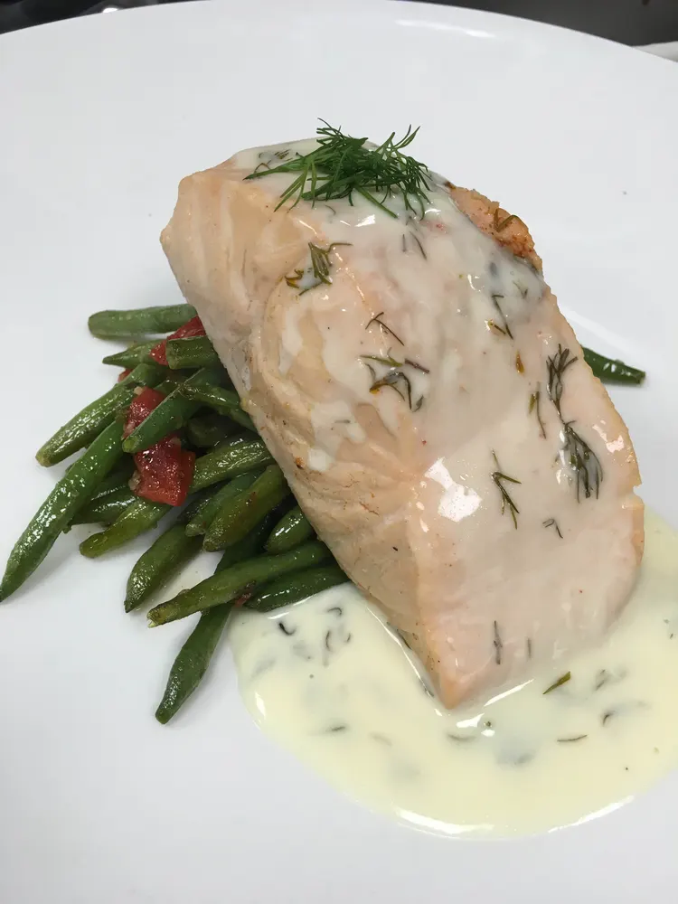 Salmon with a creamy dill sauce and green beans